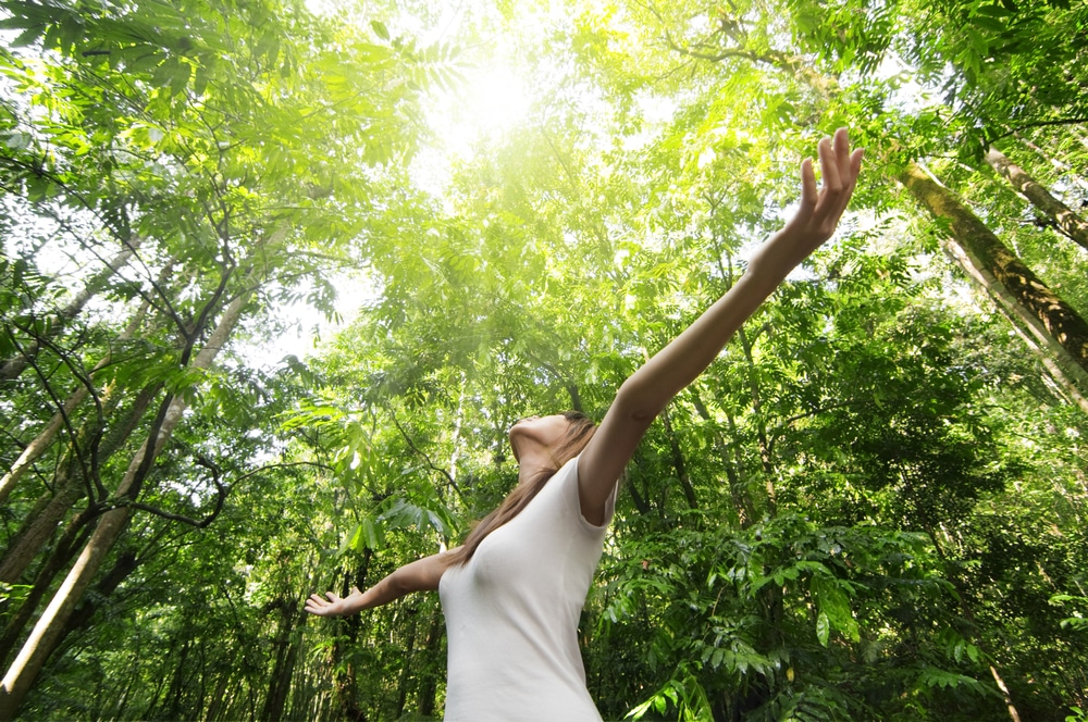 enjoying,the,nature.,young,woman,arms,raised,enjoying,the,fresh