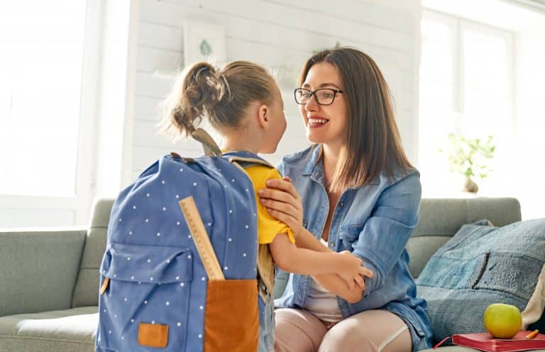 parent,and,pupil,of,preschool.,woman,and,girl,with,backpack