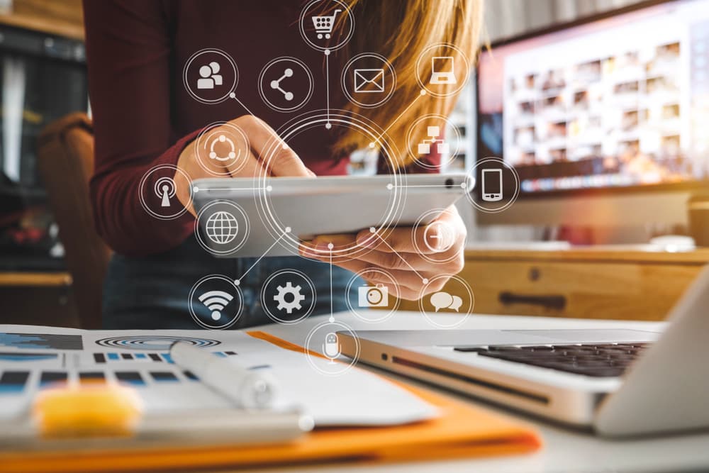 businesswoman,hand,working,with,laptop,computer,,tablet,and,smart,phone