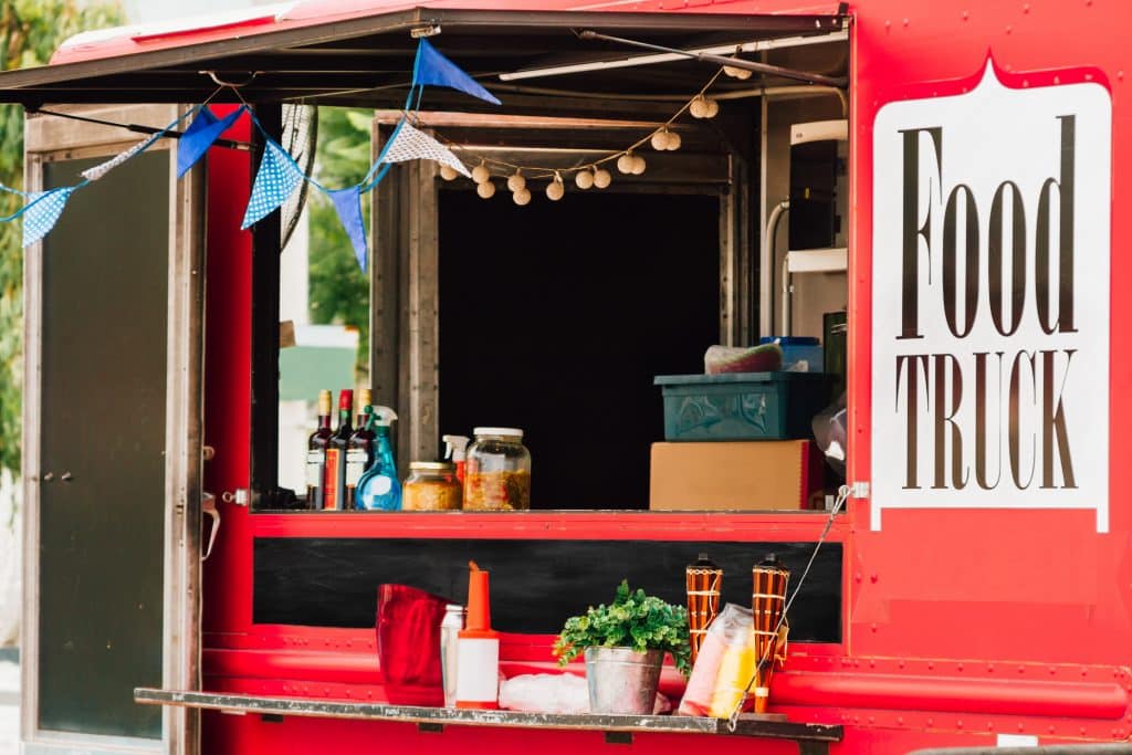 window,selling,a,red,food,truck,with,pennants