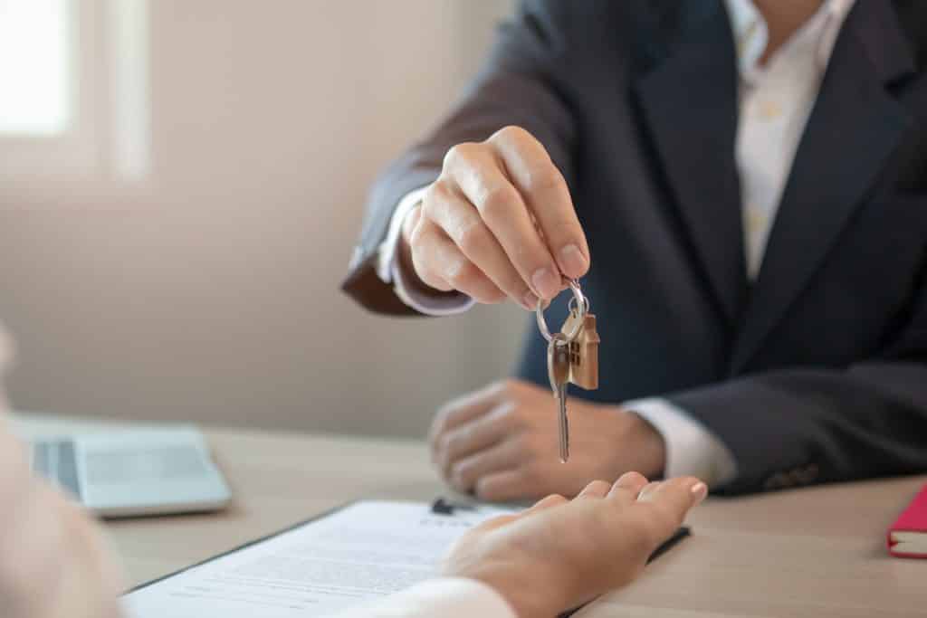 close,up,hand,of,home,apartment,agent,or,realtor,was,holding