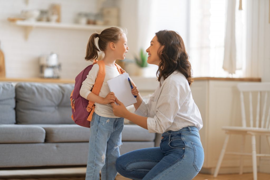 happy,family,preparing,for,school.,little,girl,with,mother.