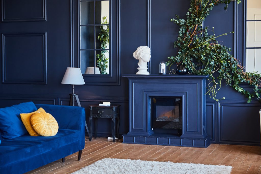 modern,interior,with,fireplace,,spacious,living,room,with,dark,blue